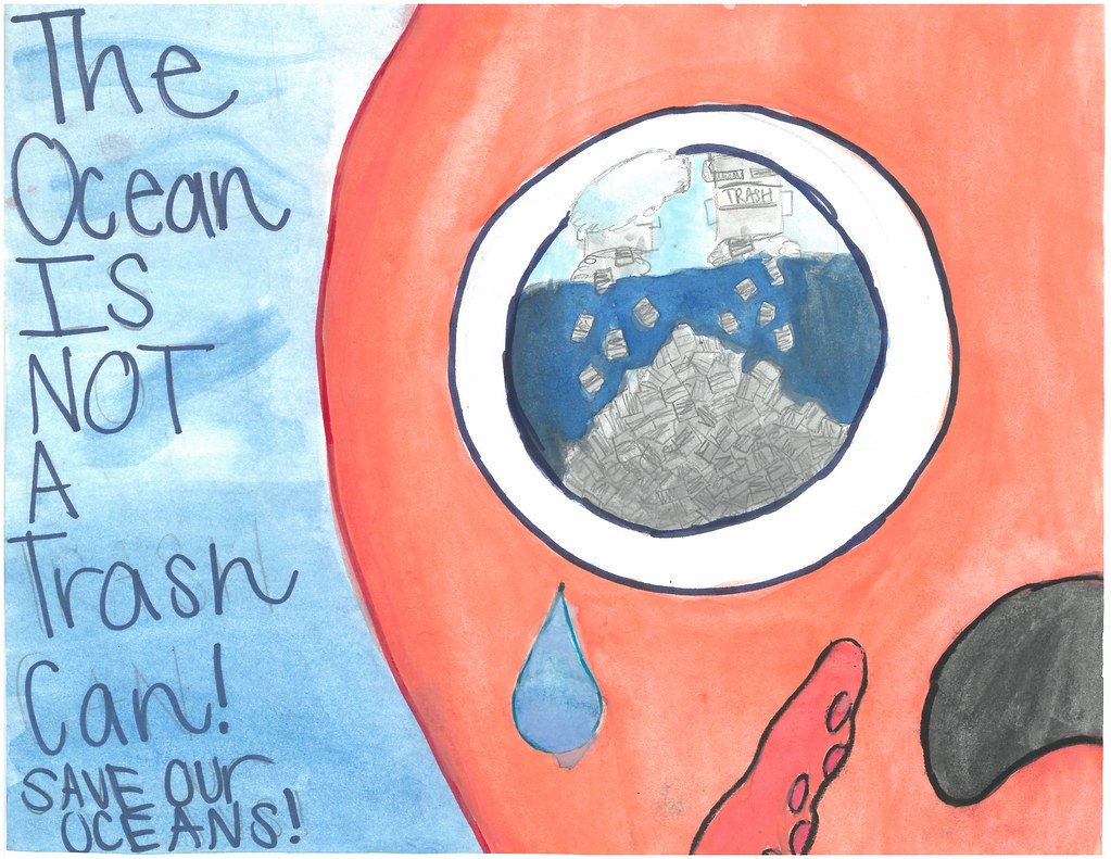 A picture created by hand by a child saying "save our oceans, the ocean isnt a trashcan!"
