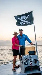aj mins and wife , operators of blackjack point oyster farm